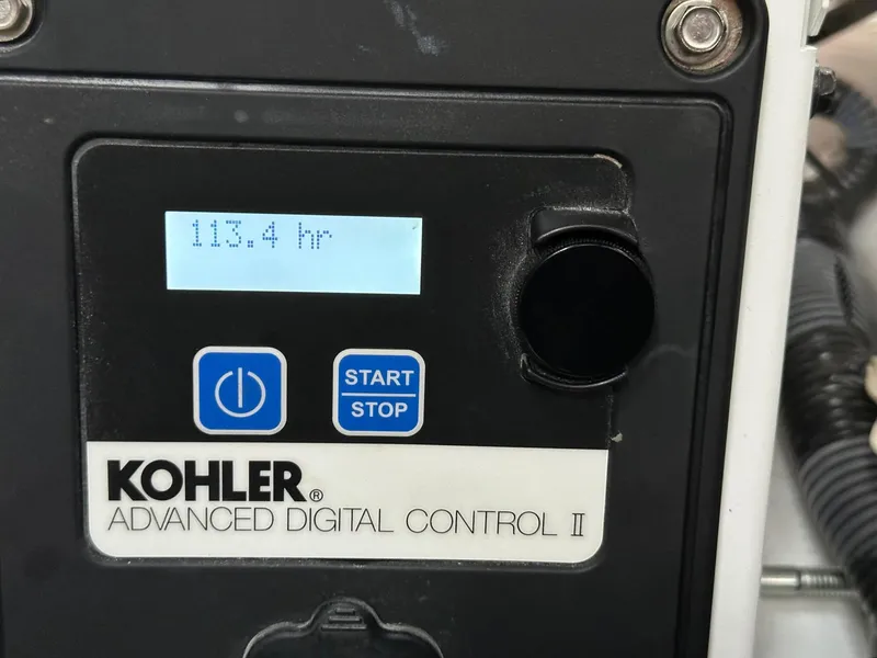 Slide: The Image of Kohler Advanced Digital Control II displaying 113.4 hours on Crownline 330 SY, 2020 model. - 14