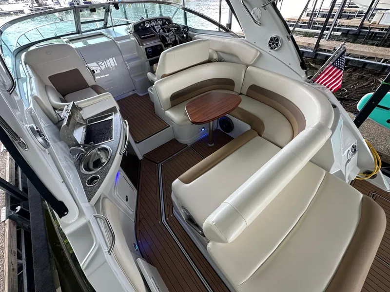 Slide: The Image of Luxurious 2020 Crownline 330 SY yacht interior with plush seating and elegant design. - 33