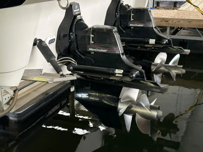 Slide: The Image of Crownline 330 SY 2020 boat with MerCruiser engines in docked position. - 40
