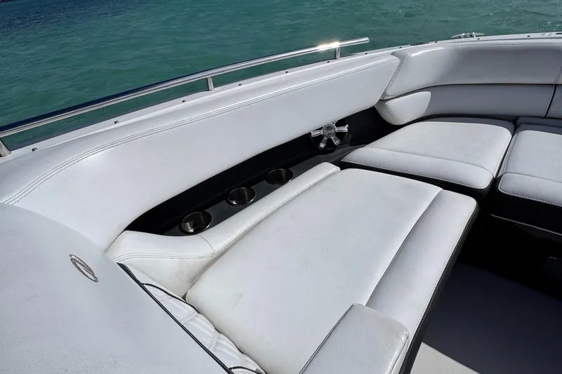 Slide: The Image of Luxurious seating on 2018 Regal 29 OBX boat with ocean backdrop. - 32