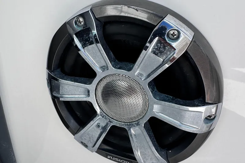 Slide: The Image of Close-up of a Fusion speaker on a 2018 Regal 29 OBX boat. - 36