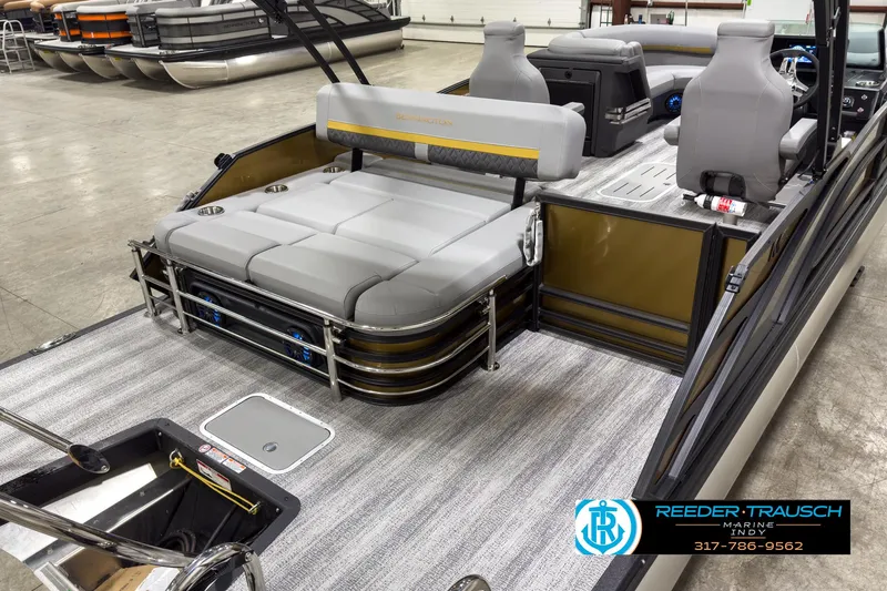 Slide: The Image of 2025 Bennington 22 MSB pontoon boat interior with gray seating and modern design. - 11