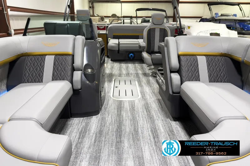 Slide: The Image of 2025 Bennington 22 MSB pontoon boat interior with luxurious seating and modern design. - 13