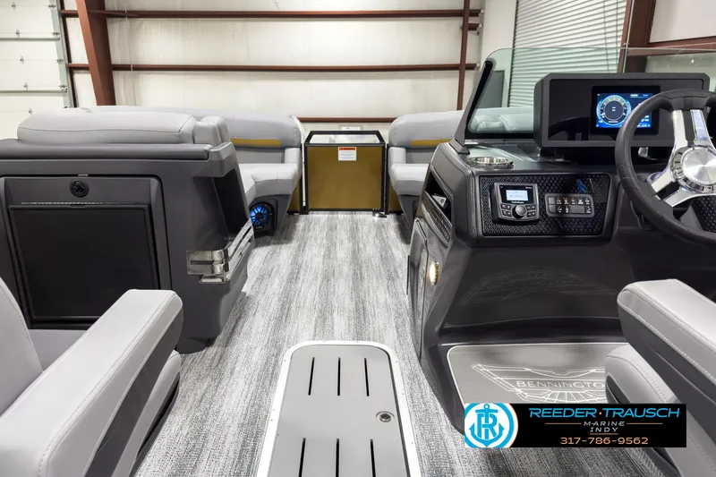 Slide: The Image of Interior of 2025 Bennington 22 MSB pontoon boat with modern dashboard and seating. - 17