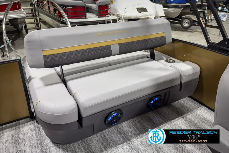 Slide: The Image of 2025 Bennington 22 MSB boat interior with plush seating and built-in speakers. - 24