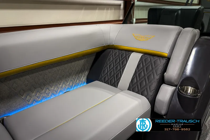 Slide: The Image of Luxurious seating in 2025 Bennington 22 MSB boat with elegant stitching and ambient lighting. - 42