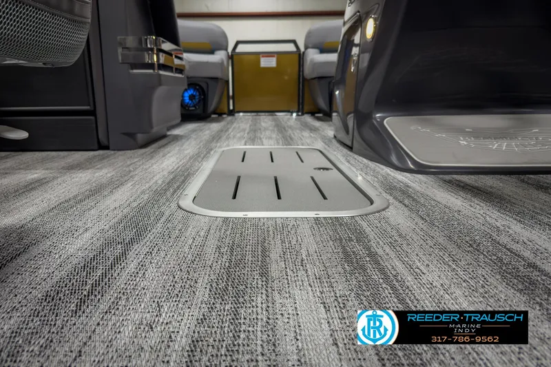 Slide: The Image of Interior view of 2025 Bennington 22 MSB boat with sleek flooring design. - 45