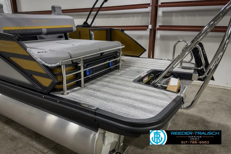 Slide: The Image of 2025 Bennington 22 MSB pontoon boat with sleek design in showroom. - 49