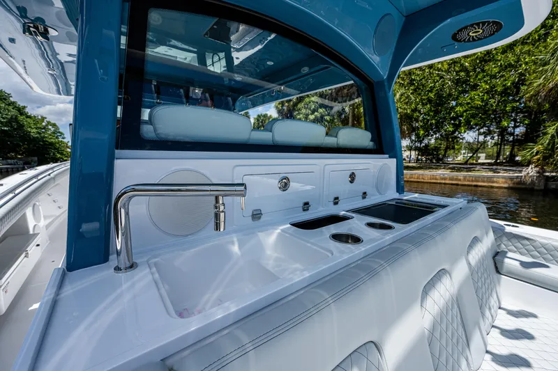 Slide: The Image of Luxury 2023 HCB 53 Sueños yacht interior with sleek kitchen amenities. - 11