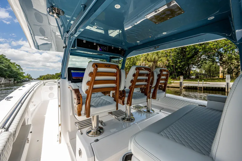 Slide: The Image of Luxurious 2023 HCB 53 Sueños boat interior with elegant seating and modern design. - 13