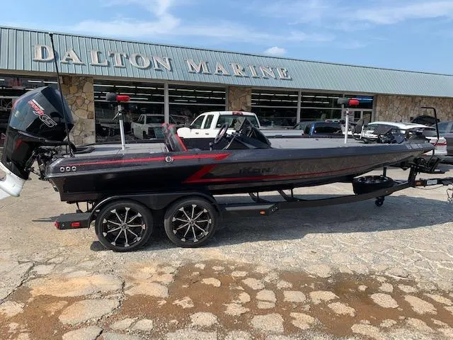 The Image of 2024 iKon LX20 boat at Dalton Marine dealership, featuring sleek design and modern features. - 1