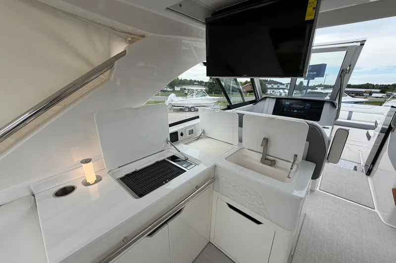 Slide: The Image of Luxurious 2025 Regal LS36 yacht interior with modern kitchen and sleek design features. - 8