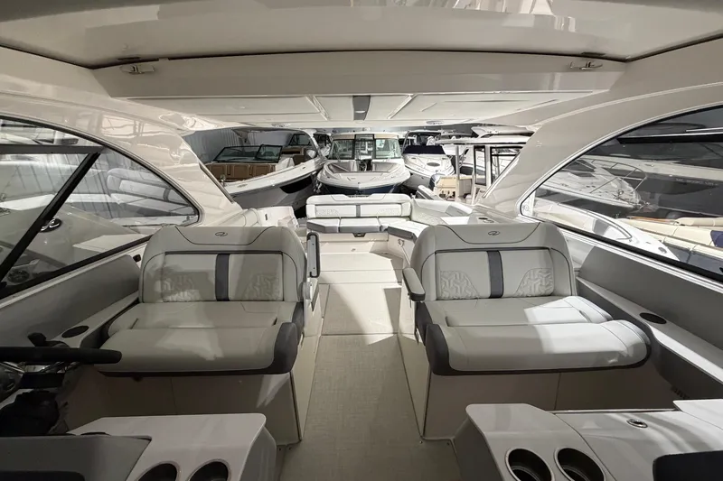 Slide: The Image of Luxurious interior of 2025 Regal LS36 boat, featuring elegant seating and modern design. - 17