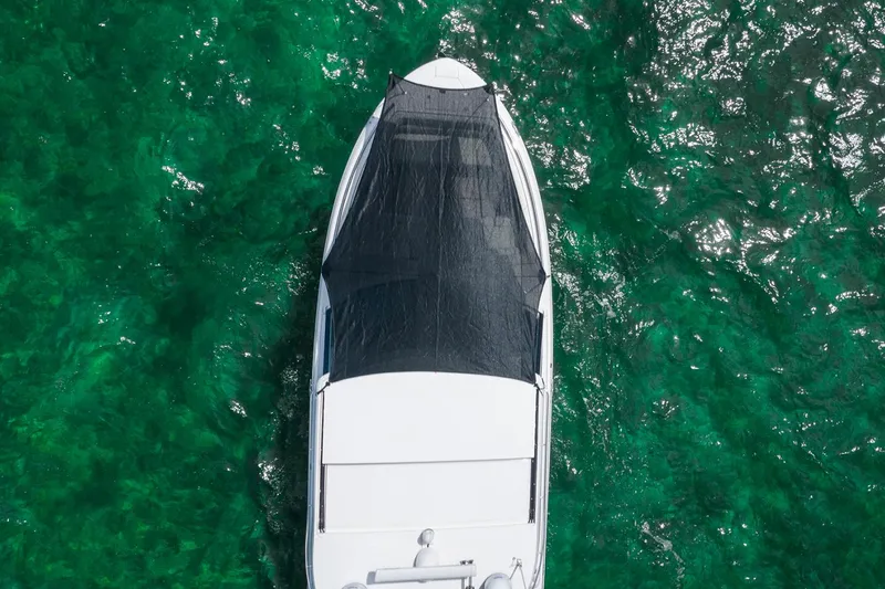 Slide: The Image of 2025 Regal LS36 boat in indoor storage, showcasing sleek design and modern features. - 5