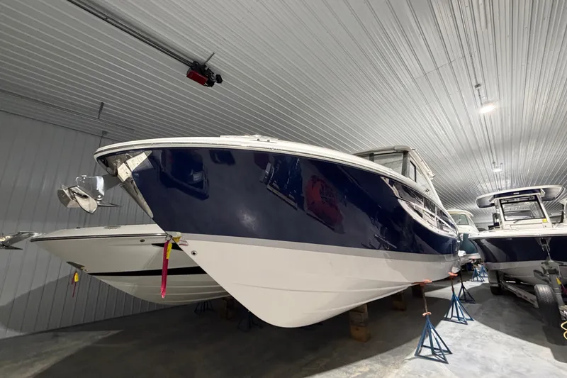 Slide: The Image of 2025 Regal LS36 boat in storage, showcasing sleek design and modern features. - 2