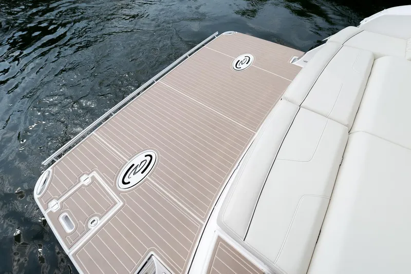 Slide: The Image of 2025 Regal LS36 boat cockpit with modern steering and control panel. - 6