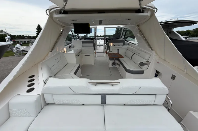 Slide: The Image of Luxurious interior of 2025 Regal LS36 boat with spacious seating and modern amenities. - 6