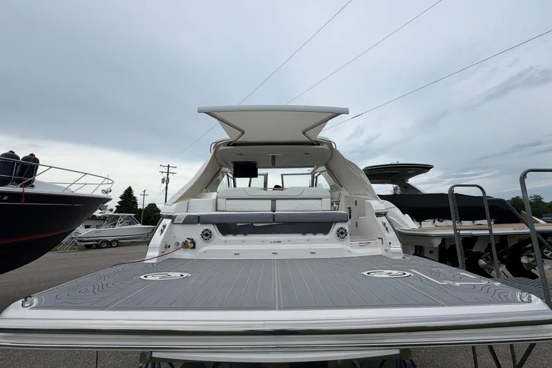 Slide: The Image of 2025 Regal LS36 luxury boat with spacious deck and modern design. - 3