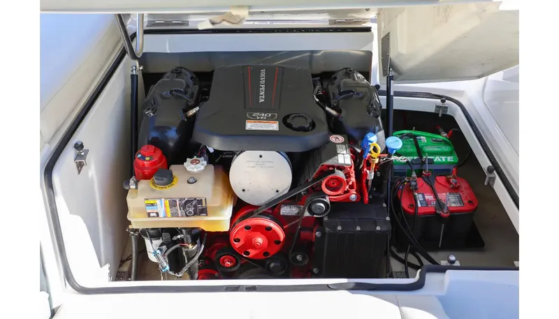 Slide: The Image of Engine compartment of a 2018 Cobalt 220S boat, featuring a well-organized layout. - 11