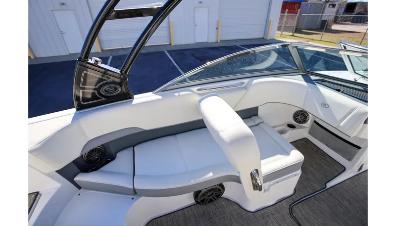 Slide: The Image of 2018 Cobalt 220S boat interior with white seating and modern design. - 14
