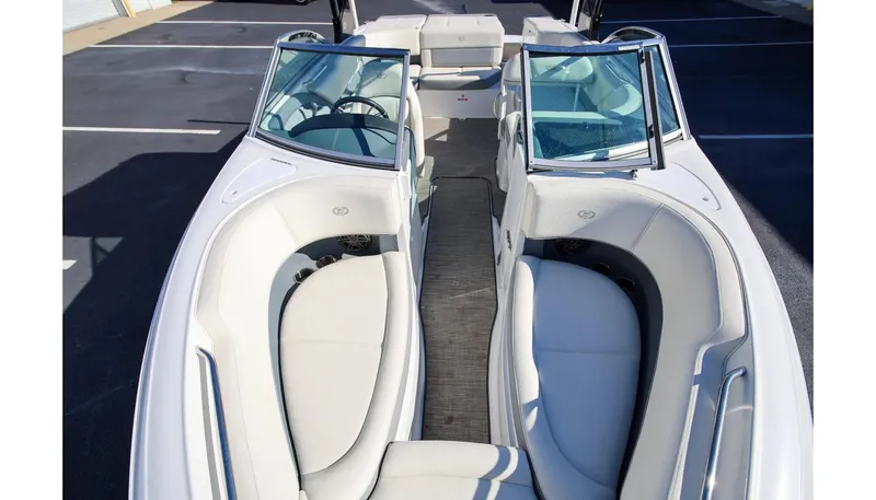 Slide: The Image of 2018 Cobalt 220S boat interior with white seating and open bow design. - 19