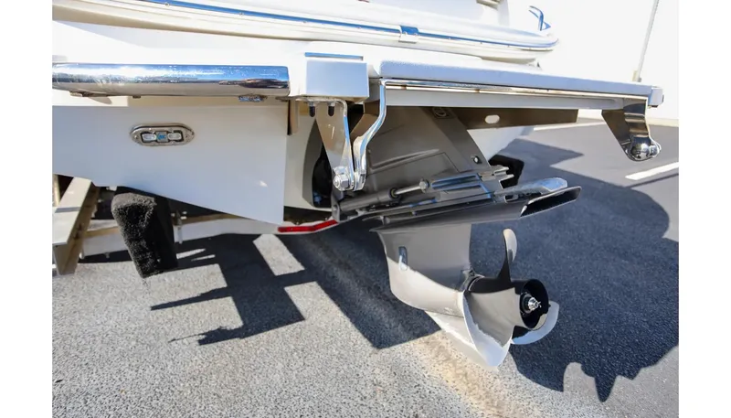 Slide: The Image of 2018 Cobalt 220S boat stern with propeller and trim tabs visible. - 5