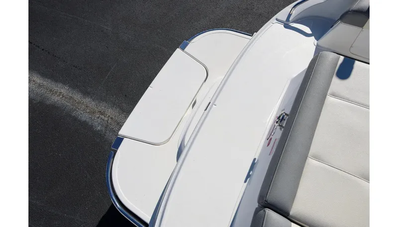 Slide: The Image of 2018 Cobalt 220S boat swim platform with seating, shown in bright sunlight. - 7