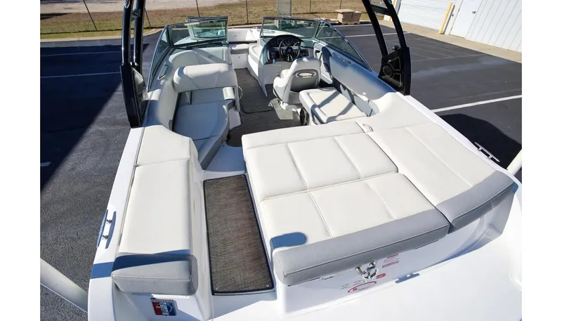 Slide: The Image of 2018 Cobalt 220S boat interior with white seating and modern design. - 8