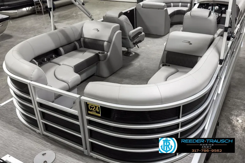 Slide: The Image of 2022 Bennington 23 LSR pontoon boat with luxurious seating and modern design. - 11