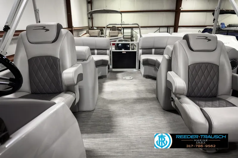 Slide: The Image of 2022 Bennington 23 LSR boat interior with luxurious seating and modern design. - 14