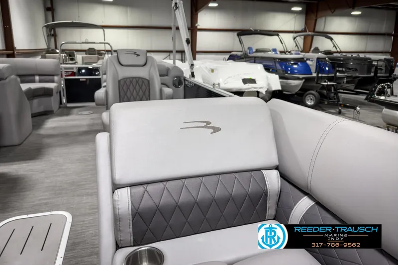 Slide: The Image of Interior of 2022 Bennington 23 LSR pontoon boat with luxurious seating. - 20