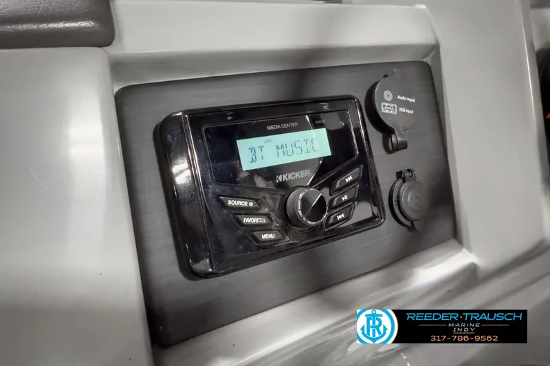Slide: The Image of Bennington 23 LSR 2022 boat stereo system with digital display and controls. - 27