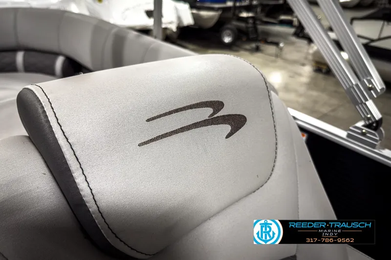 Slide: The Image of 2022 Bennington 23 LSR boat seat with logo, showcased at Reeder-Trausch Marine. - 34
