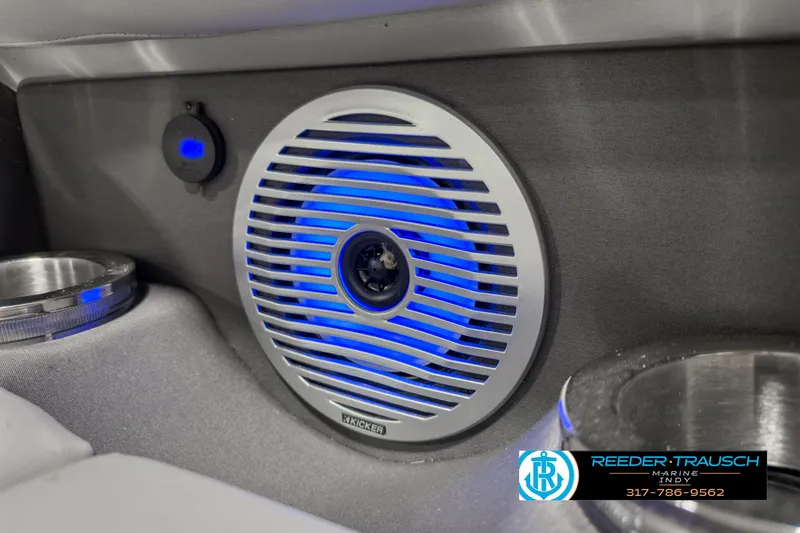 Slide: The Image of 2022 Bennington 23 LSR boat speaker with blue LED lighting and cup holders. - 38