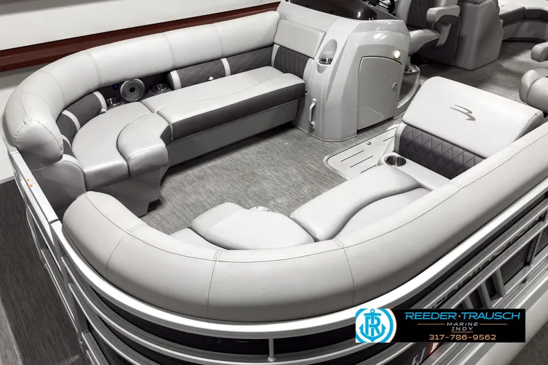 Slide: The Image of 2022 Bennington 23 LSR pontoon boat interior with luxurious seating and modern design. - 9