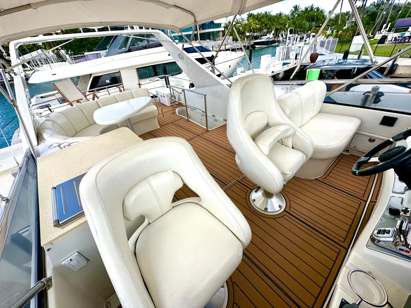 Slide: The Image of Luxurious 2007 Marquis 59 Markham Edition yacht interior with plush seating and elegant design. - 18