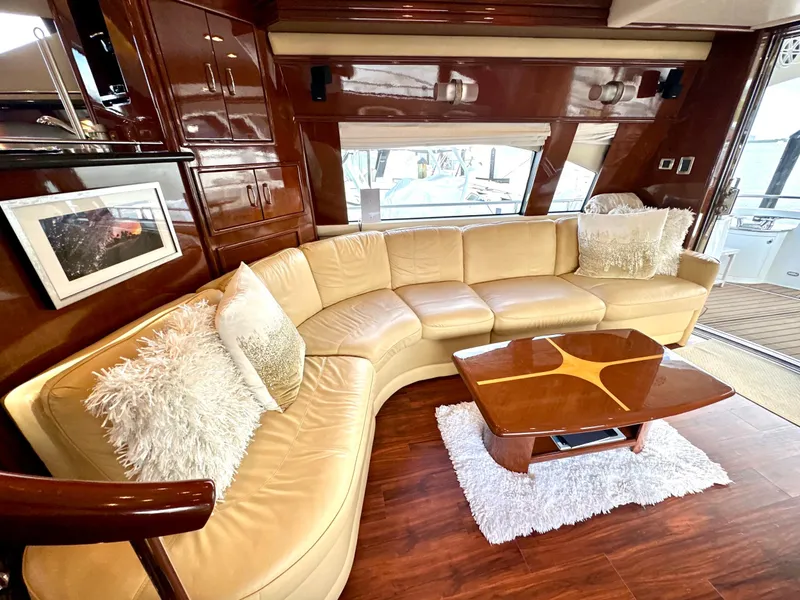Slide: The Image of Luxurious interior of 2007 Marquis 59 Markham Edition yacht with plush seating and elegant decor. - 26