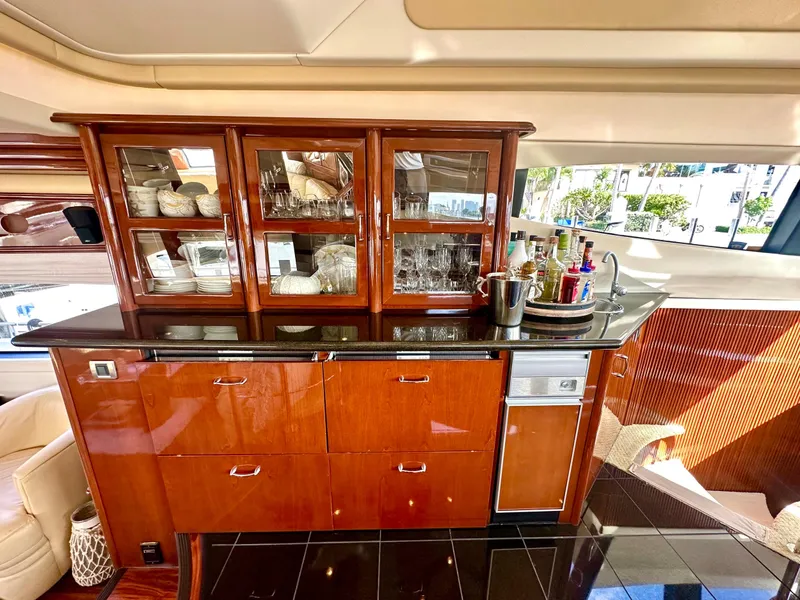 Slide: The Image of Luxurious yacht interior with elegant wooden cabinetry and glassware, Marquis 59 Markham Edition, 2007. - 29