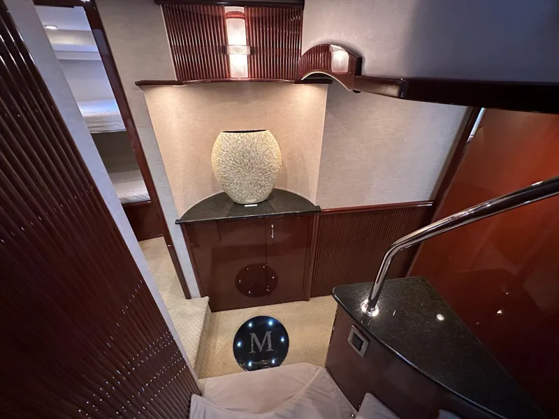 Slide: The Image of Luxurious interior of 2007 Marquis 59 Markham Edition yacht with elegant wood finishes. - 33