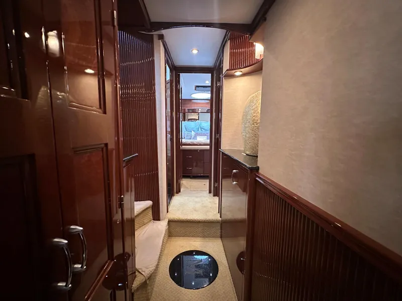 Slide: The Image of Luxurious interior of 2007 Marquis 59 Markham Edition yacht with elegant wood paneling. - 34