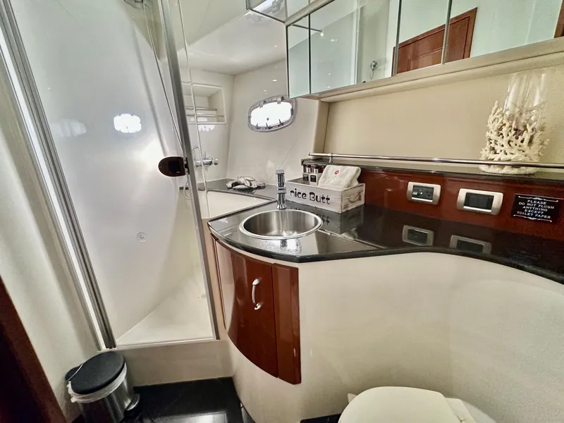 Slide: The Image of Luxurious 2007 Marquis 59 Markham Edition yacht bathroom with modern fixtures and elegant design. - 36