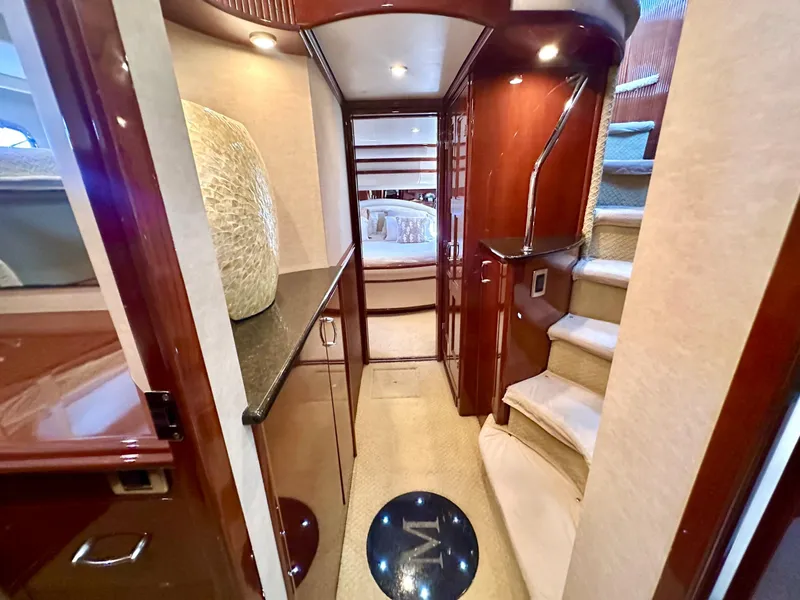 Slide: The Image of Luxurious interior of 2007 Marquis 59 Markham Edition yacht with elegant wood finishes. - 39