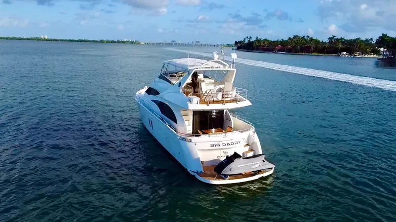 Slide: The Image of Luxury 2007 Marquis 59 Markham Edition yacht cruising on open water. - 4