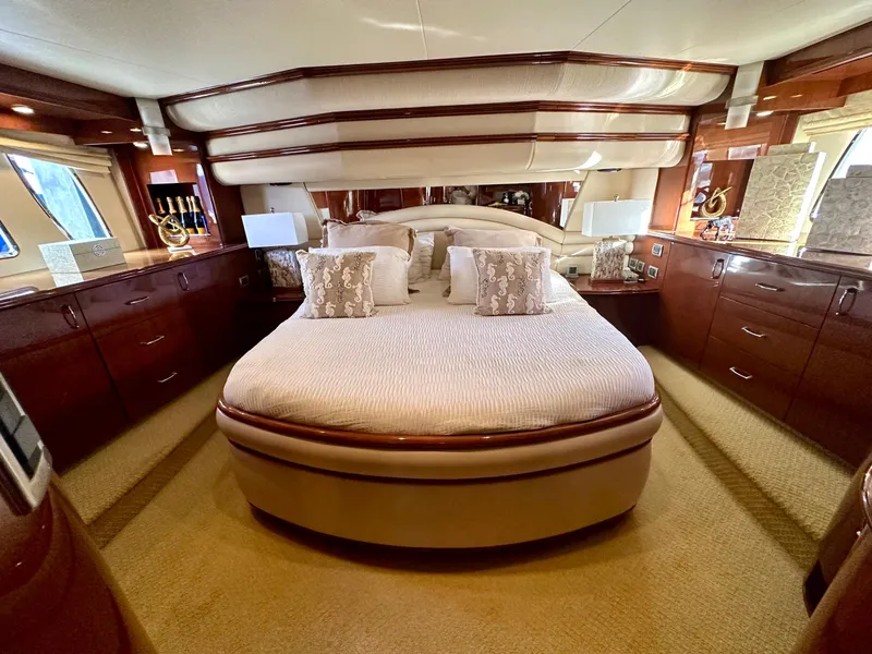Slide: The Image of Luxurious 2007 Marquis 59 Markham Edition yacht bedroom with elegant wood finishes. - 41