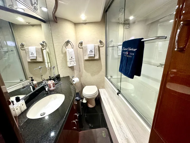 Slide: The Image of Luxurious bathroom in 2007 Marquis 59 Markham Edition yacht with modern amenities. - 46