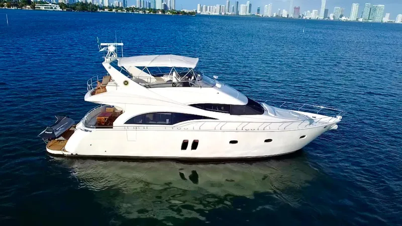 Slide: The Image of Luxury 2007 Marquis 59 Markham Edition yacht on open water. - 5