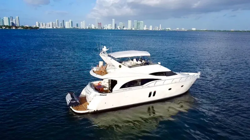 Slide: The Image of Luxurious 2007 Marquis 59 Markham Edition yacht cruising on open water. - 7