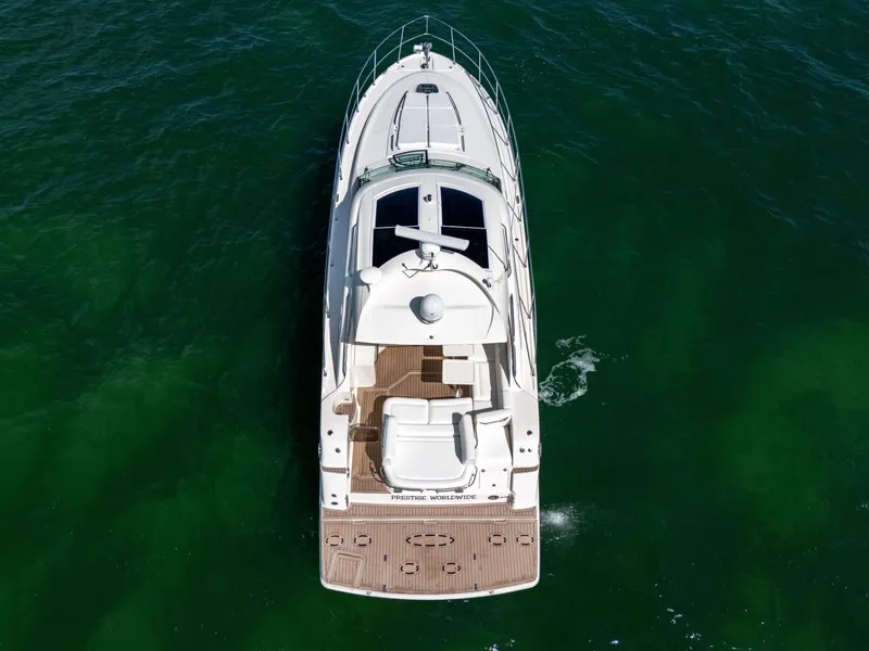 Slide: The Image of Aerial view of 2011 Sea Ray 470 Sundancer yacht on open water. - 23