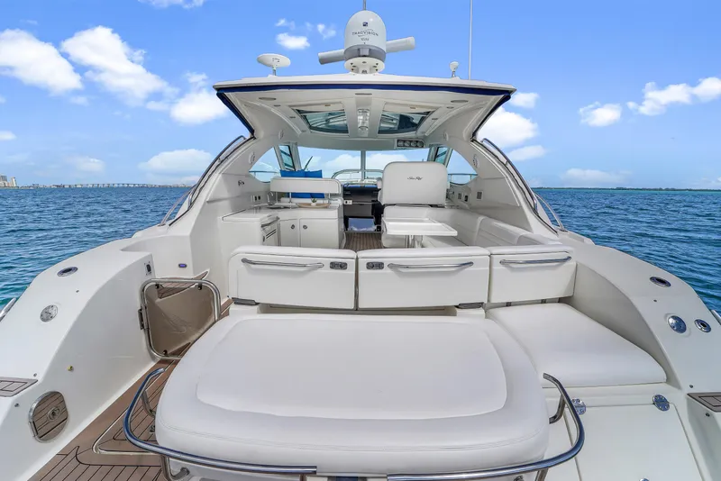 Slide: The Image of 2011 Sea Ray 470 Sundancer yacht with spacious deck and ocean view. - 40
