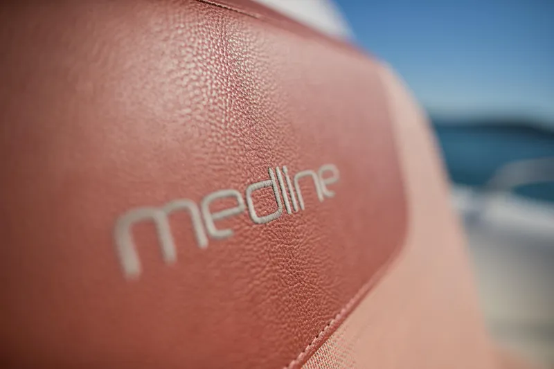 Slide: The Image of Close-up of 2025 Zodiac Medline 9 boat seat with logo in focus. - 15